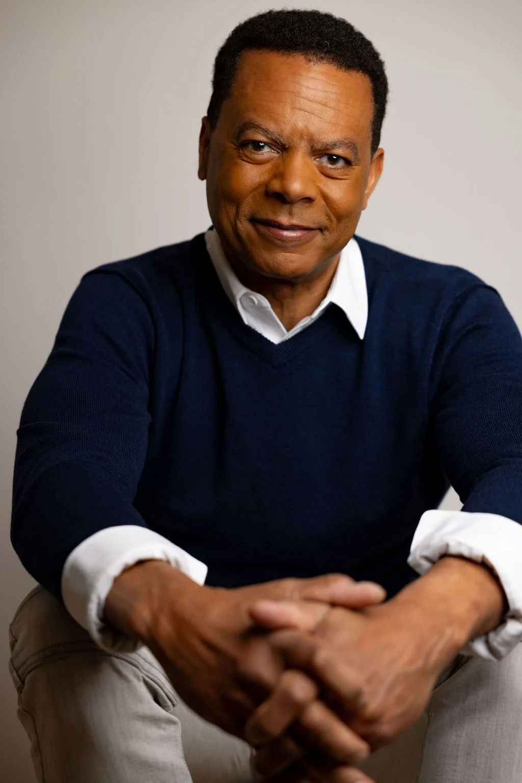 Kevin Dean Williams - White shirt blue sweater